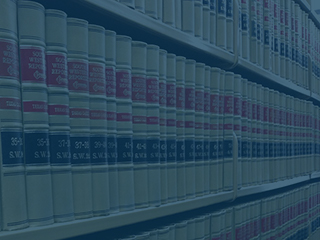 Image of legal books with Meridian Legal System's logo overlaid