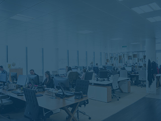 Image of an office environment with Wyvern DM's logo overlaid